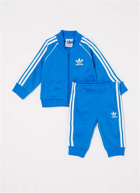 adidas superstar trainingspak blauw|Adidas Superstar trainingspak met logo 2.